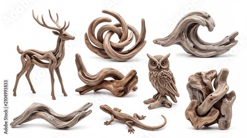 Collection of intricate wooden animal sculptures and organic driftwood shapes isolated on white background