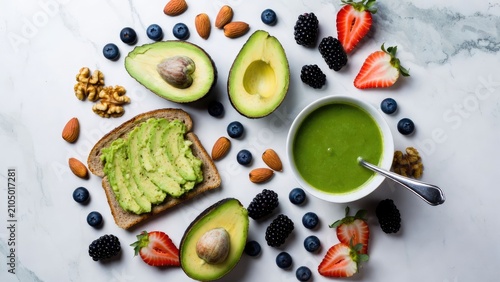 Delicious avocado toast topped with fresh berries and a mix of nuts served on a stylish marble countertop