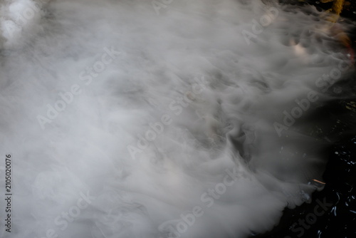 Morning Mist Floating Gently Over Still Waters.
Serene Water Veiled in Ethereal Mist.