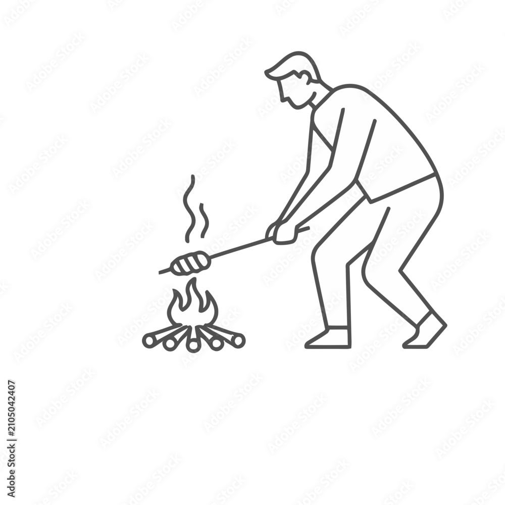 Fototapeta premium Man cooking sausage over campfire