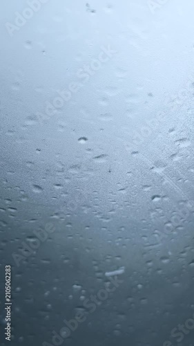 Windshield covered in ice crystals and snowflakes The Concept of cold weather