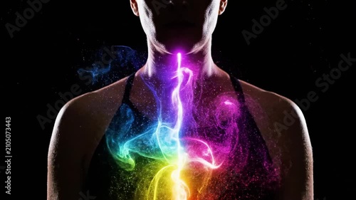 Rainbow energy glow emanating from human chest silhouette.