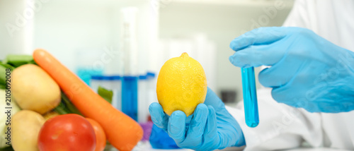 Canvastavla Scientist check chemical food residues in laboratory