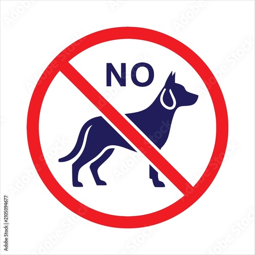 Dog prohibition sign displays a graphic silhouette of a canine inside a red circle with a diagonal slash to communicate that pets are not allowed in this specific location.