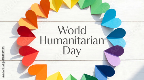 World Humanitarian Day Bright Flat Lay Rainbow Paper Hearts White Wooden Background
