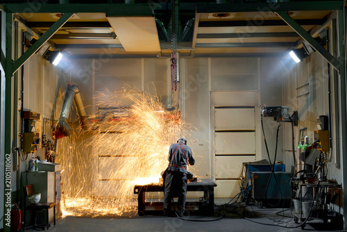 Welder working in a factory