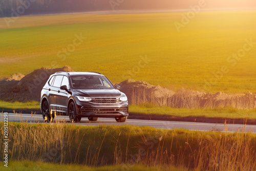 Modern luxury SUV on quiet rural road