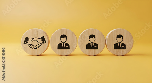 Wooden blocks with business icons representing partnership and professional human resources management and recruitment team strategy
