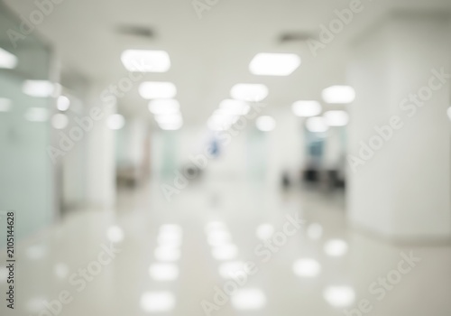 Blurred view of a modern bright office corridor