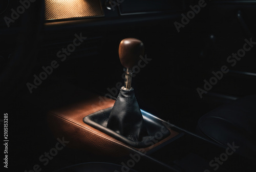 Wooden Manual Gear Shift Lever in Dark Vintage Car Interior