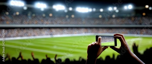 Exciting match taking place in a large stadium with fans cheering and lights shining bright