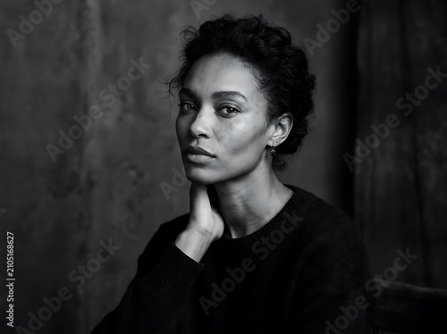Portrait of a woman in vintage black and white photograph.