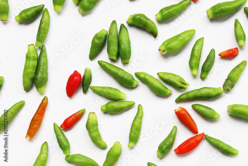 Tableau sur toile Fresh bird's eye chilies on white background.