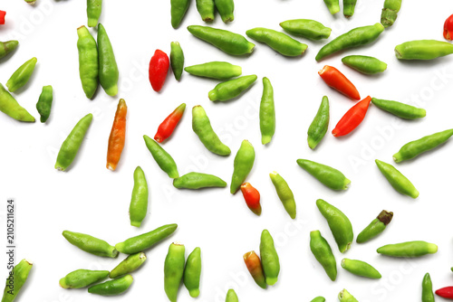 Photos Fresh bird's eye chilies on white background.