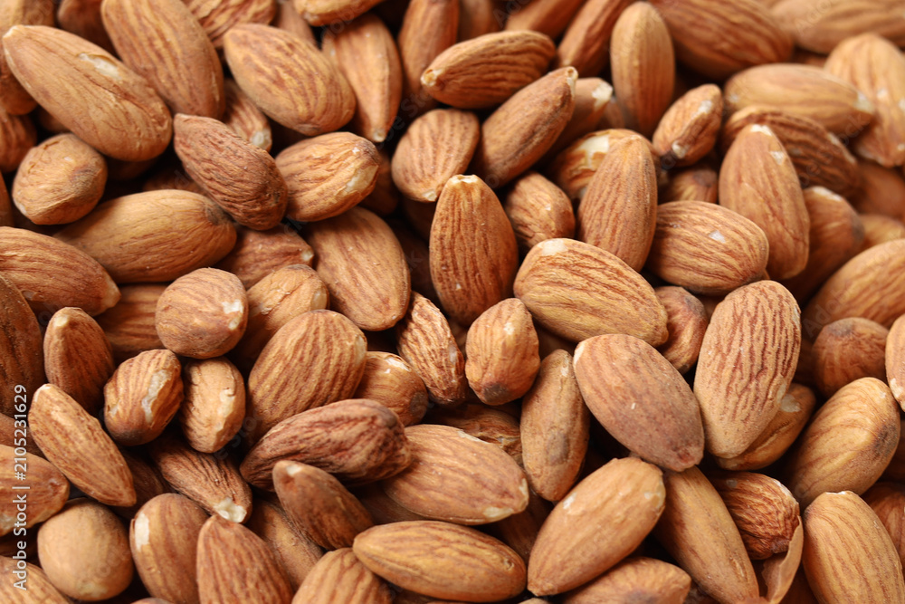 Fototapeta premium Almond nuts isolated on white background
