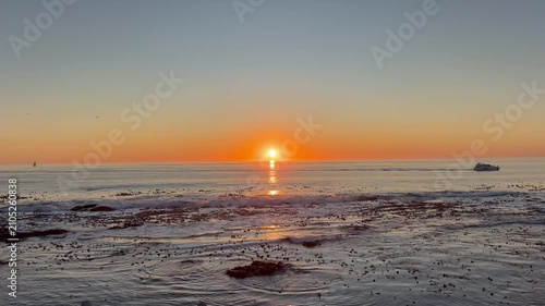 Sunset over the South Atlantic Ocean Sea Point, Cape Town, South Africa.