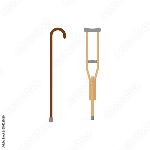 фотографія Mobility aid featuring a wooden walking cane with a curved handle and a standard
