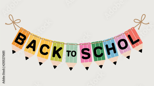 Back to School banner made of colorful pencil shapes hanging on twine with 