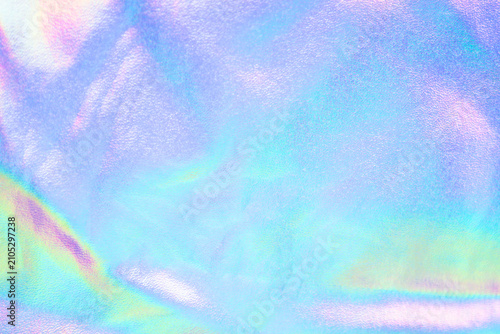 Holographic iridescent pastel texture background with soft shimmer and rainbow gradient