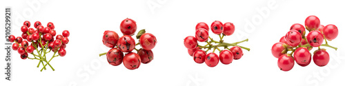 Pink peppercorn clusters isolated on black background for culinary use