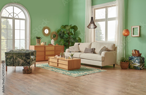 Green living room and wall background concept, wooden furniture, table, chair vase of plant and brown parquet style.