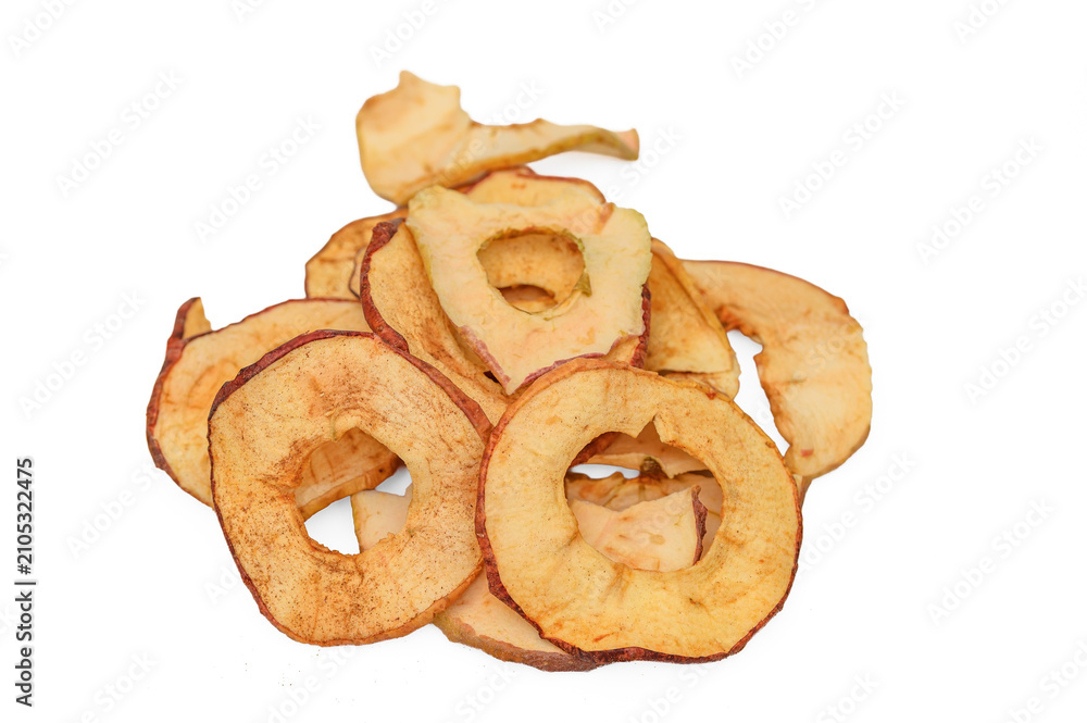 Fototapeta premium Apple chips with cinnamon, a crunchy insulated snack