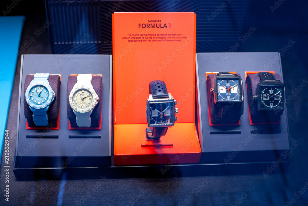 Fototapeta premium Luxury TAG Heuer Watches on a Showcase Display with Formula One and Monaco Collections for Retail. TAG Heuer Logo store shop. Como, Italy - June 24, 2026