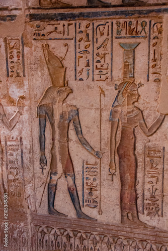 Obraz na płótnie Ancient relief of Horus and Isis with hieroglyphs inside Edfu Temple Egypt