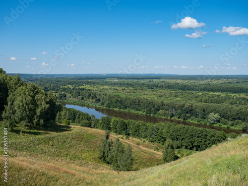 the beauty of the Russian land. The nature of the native land.The forest is a river on a summer day.