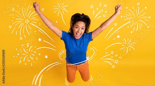 celebration success woman joy jumping freedom yellow fireworks excitement victory Ecstatic adult leaps with raised arms amid bursts expressing achievement and optimism for milestone campaigns