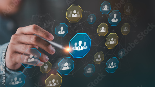 Foto Network administrator manages connection, network, communication, collaboration, connectivity, organization, and integration through a digital interface to strengthen modern business relationships