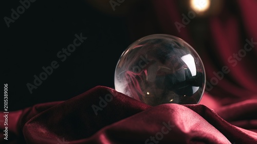 anxious. A crystal ball on velvet cloth, foggy surface reflecting a distorted, anxious silhouette. wellbeing guides, coaching materials, designed for coaching and self-improvement content.