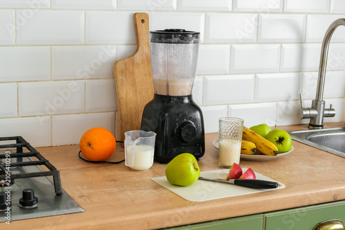 Konstfotografi Electric blender on kitchen counter for smoothie making process