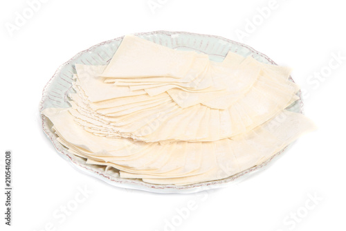Handmade Thin Wonton Skins Wrapped on Plate - Traditional Chinese Dumpling Preparation