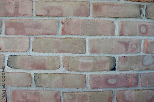 A close view of the red brick wall.