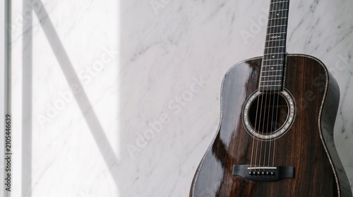 Acoustic Guitar on Marble Wall Background