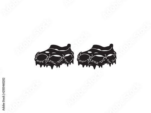 Pair of black spiked rubber overshoes for ice and snow traction with anti slip, overshoes