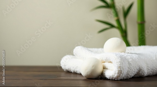 Relaxing Spa Day Soft Towels and Aromatic Bath Bombs on Wooden Surface