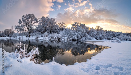 Serene Winter Landscape - Snow-Covered Trees Reflecting in Calm Lake at Sunset.