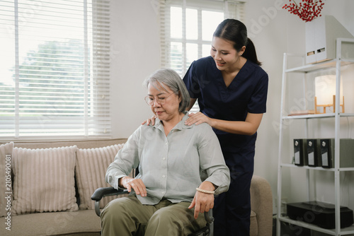 Caregiver discussing a personalized care plan with a senior wheelchair user during a compassionate home healthcare consultation.