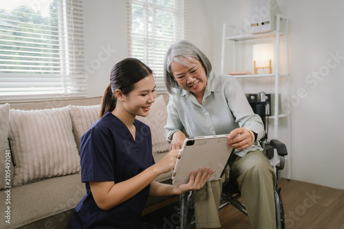 Caregiver discussing a personalized care plan with a senior wheelchair user during a compassionate home healthcare consultation.