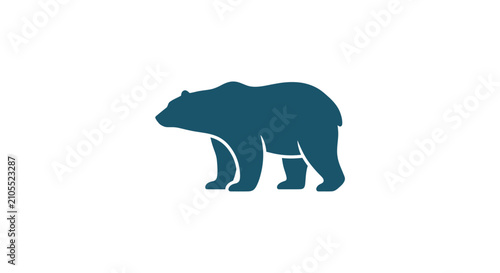 Fotografie Large Dark Blue Bear Silhouette Walking.