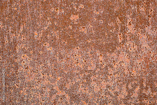 Cuadro en lienzo Metal sheet covered with rust, stains and corrosion foci is dark red