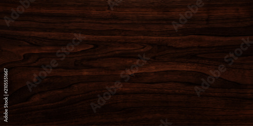 Tableau sur toile Close-up texture of rich, dark ebony wood grain with elegant swirls and flowing lines, showcasing the natural beauty of this exotic material