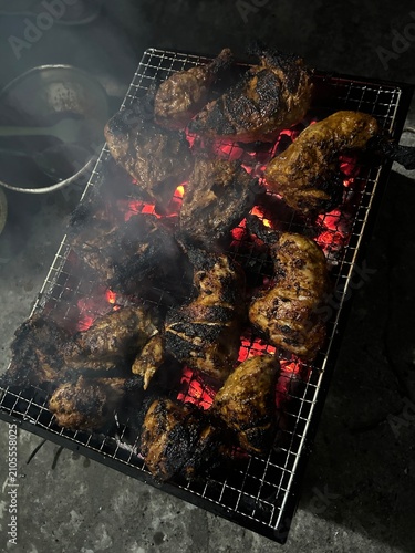 Obraz na płótnie Grilled meat skewers sizzling on barbecue grill