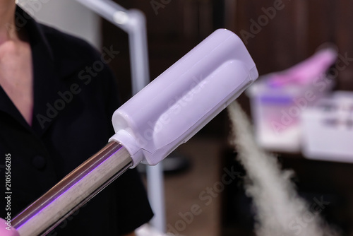 Canvastavla Close-up of a professional facial steamer producing warm steam to soften skin, open pores and prepare the face for deep cleansing and cosmetic procedures in a beauty clinic