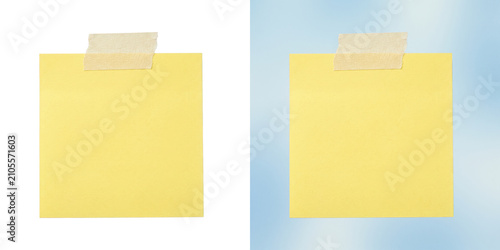 Фотография Blank yellow sticky note or post-it with masking tape for office message or remi
