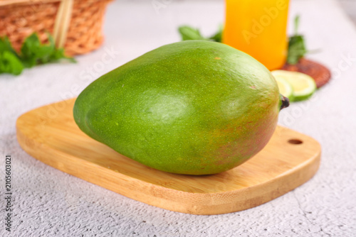 Photography Fresh Green Mango from Panzhihua Sichuan on Wooden Cutting Board - Tropical Frui