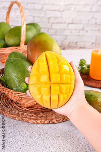 Konstfotografi Fresh Kate Mango from Panzhihua Sichuan China - Hand Holding Diced Tropical Frui