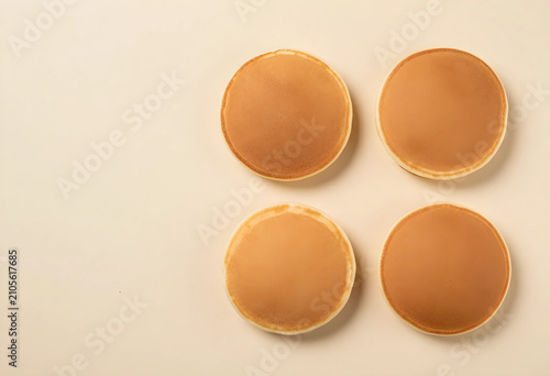 Four plain golden brown pan...